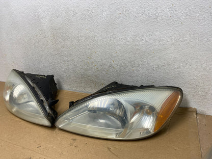 2000 to 2007 Ford Taurus Left+Right Side Halogen Headlights AH8252 DW1