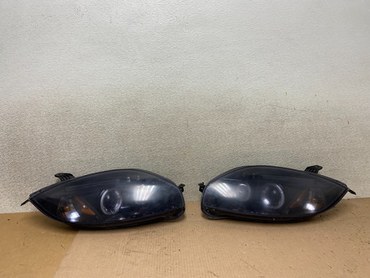 2006 - 2007 Mitsubishi Eclipse Left+Right Side Halogen Headlights AA0389 DW0