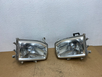 1999-2004 Nissan Pathfinder Left+Right Side Set Halogen Headlights AC3323 DW0