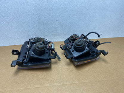 2005-2015 Nissan Xterra Driver Left+Right Set LED Black Headlights AD4480 DW7