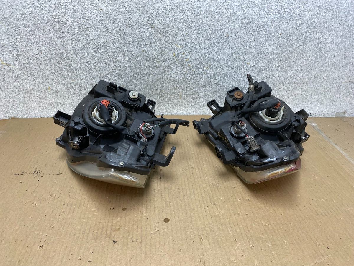 2005 2006 2007 Nissan Pathfinder Halogen Headlights Left+Right AH3068 DW9