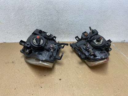 2005 2006 2007 Nissan Pathfinder Halogen Headlights Left+Right AH3068 DW9