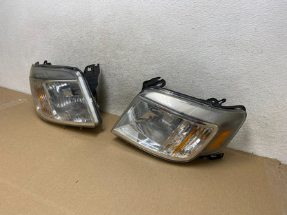 2008 to 2011 Mercury Mariner Left+Right Side Halogen Headlights AH4346 DW2