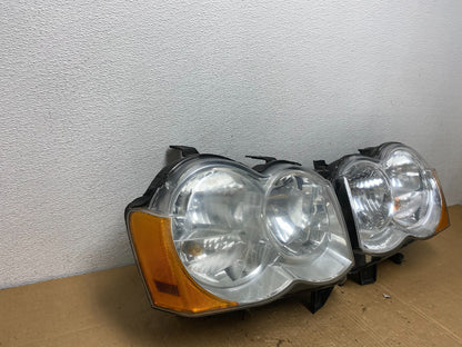 2009-2010 Jeep Grand Cherokee Left+Right Set Halogen Headlights AC7707 DW1