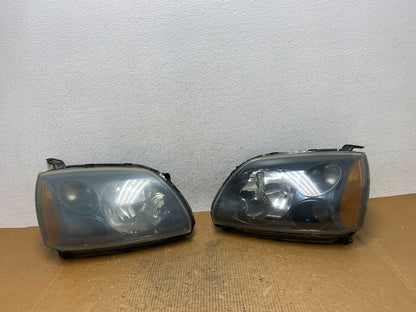 2004 to 2009 Mitsubishi Galant Left+Right Headlights Halogen AE1618 DW0