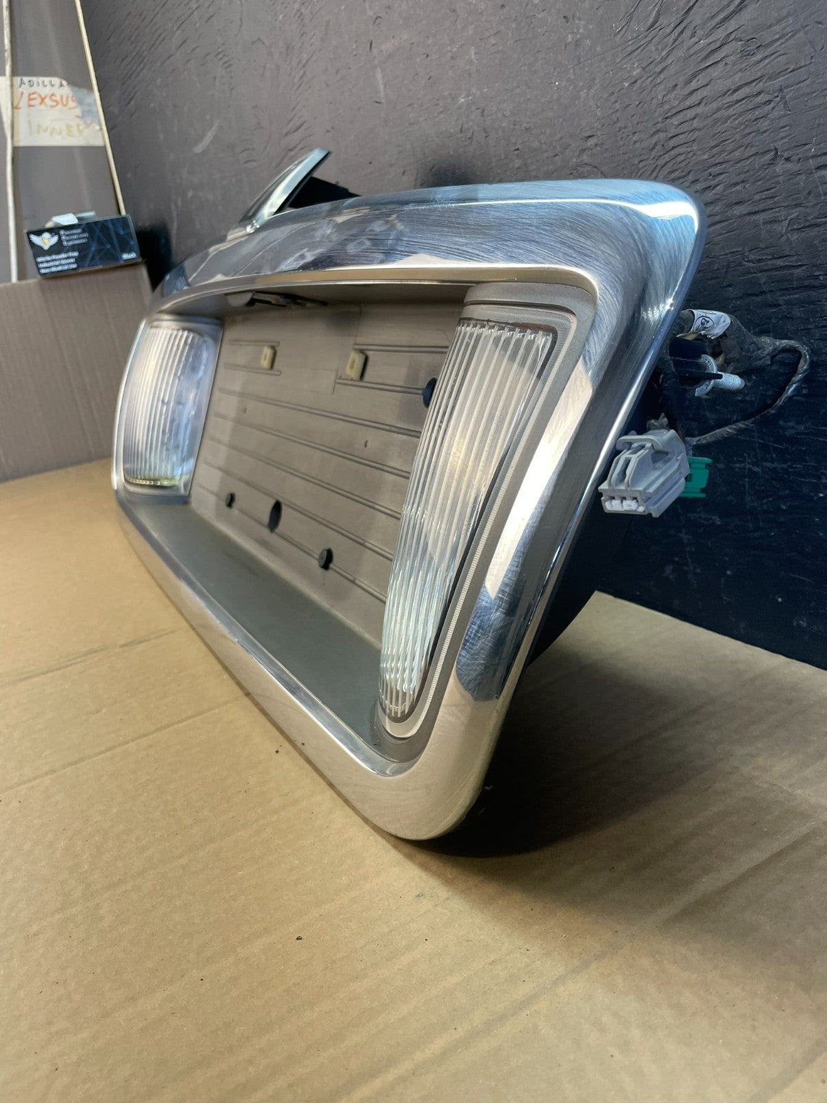 2003 to 2011 Lincoln Town Car Rear License Plate Trim Panel AC9683 DG1