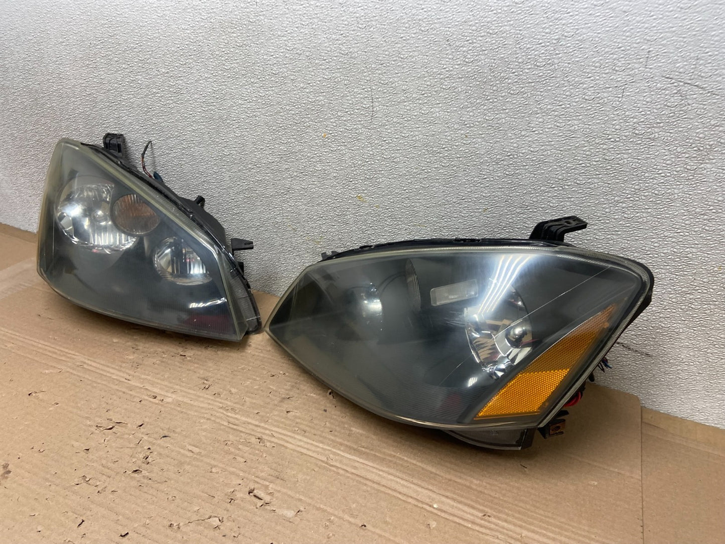 2002 to 2004 Nissan Altima Left+Right Side Set Halogen Headlights AB1132 DW1