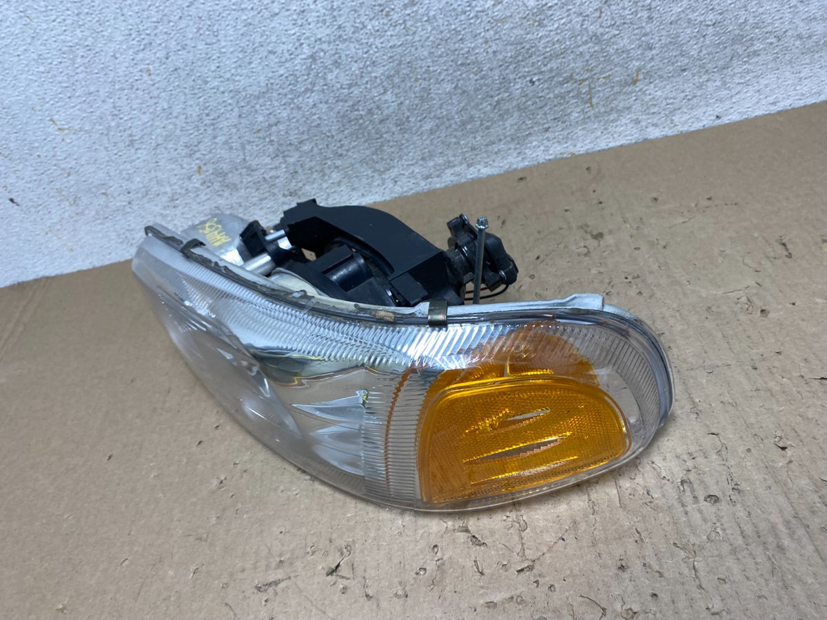 1999 - 2006 GMC Sierra Left Driver LH Halogen Headlight AJ2313 DW1