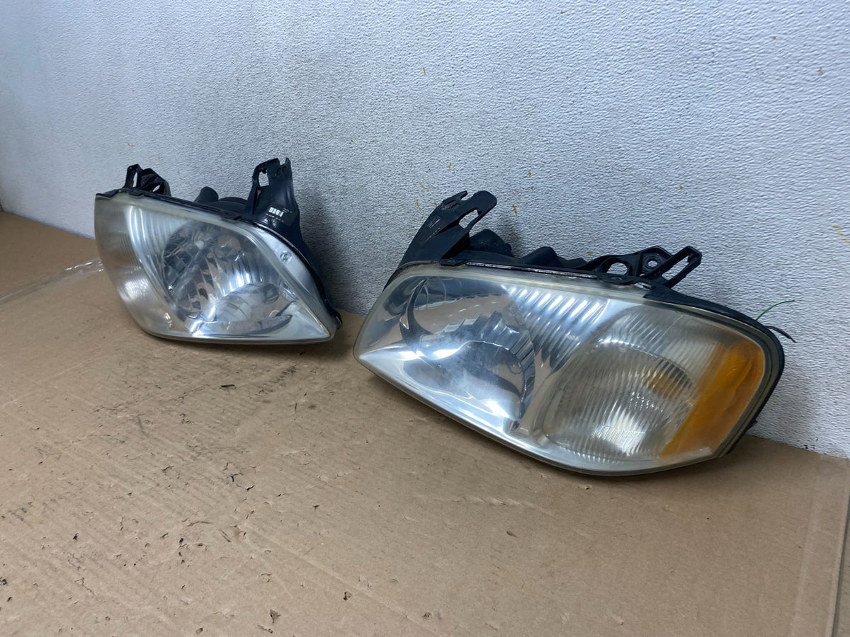 2001 2002 2003 2004 Mazda Tribute Left+Right Side Set Headlights AI0905 DW1