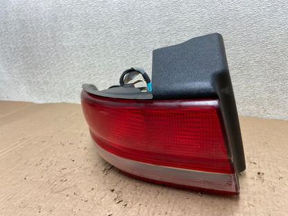 1993 to 1997 Chrysler Concorde Left Driver LH Side Tail Light OEM Y0566 GD1