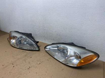 2000 to 2007 Ford Taurus Left+Right Side Halogen Headlights AF4231 LK1