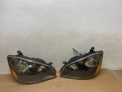 2002 to 2004 Nissan Altima Left+Right Side Set Halogen Headlights OEM Y8775 DW0