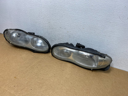 1998 to 2002 Chevrolet Camaro Pair Left and Right Headlights ad4504 DG1