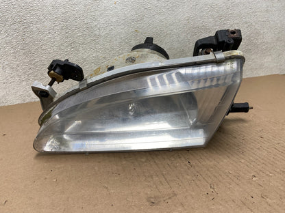 1998 to 2000 Toyota Corolla Front Left Driver Side Headlight AB5997 DW0