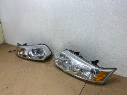 2003 to 2007 Saturn Ion Halogen Headlights Left+Right Side AE9219 DW1