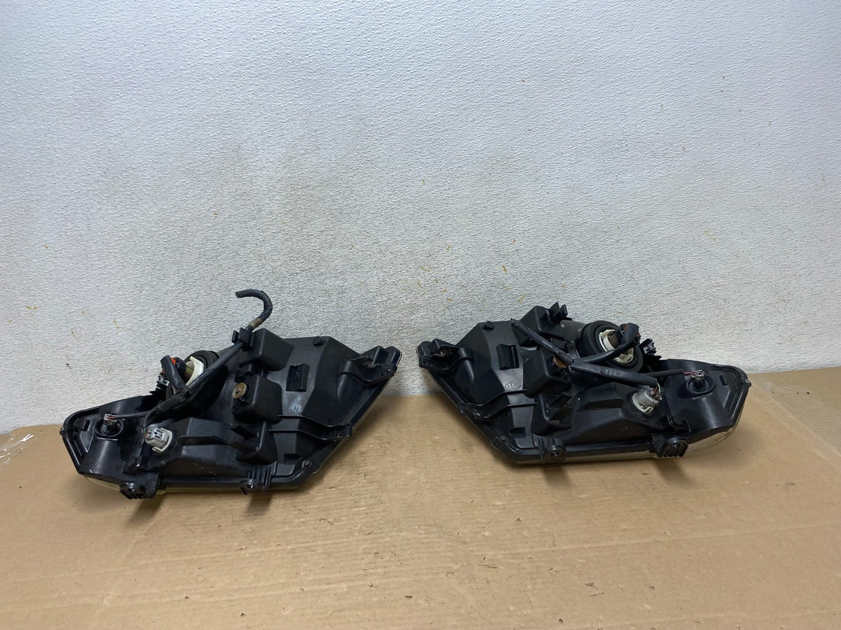 2008 to 2012 Nissan Pathfinder Halogen Headlights Left+Right AH9477 DW7