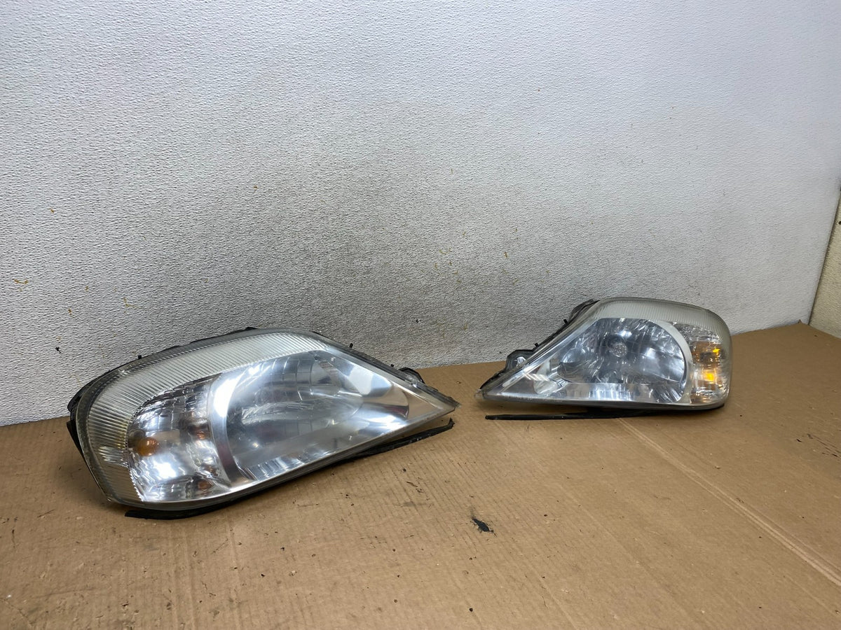 2000 to 2005 Mercury Sable Left+Right Side Halogen Headlights AI8747 DW2