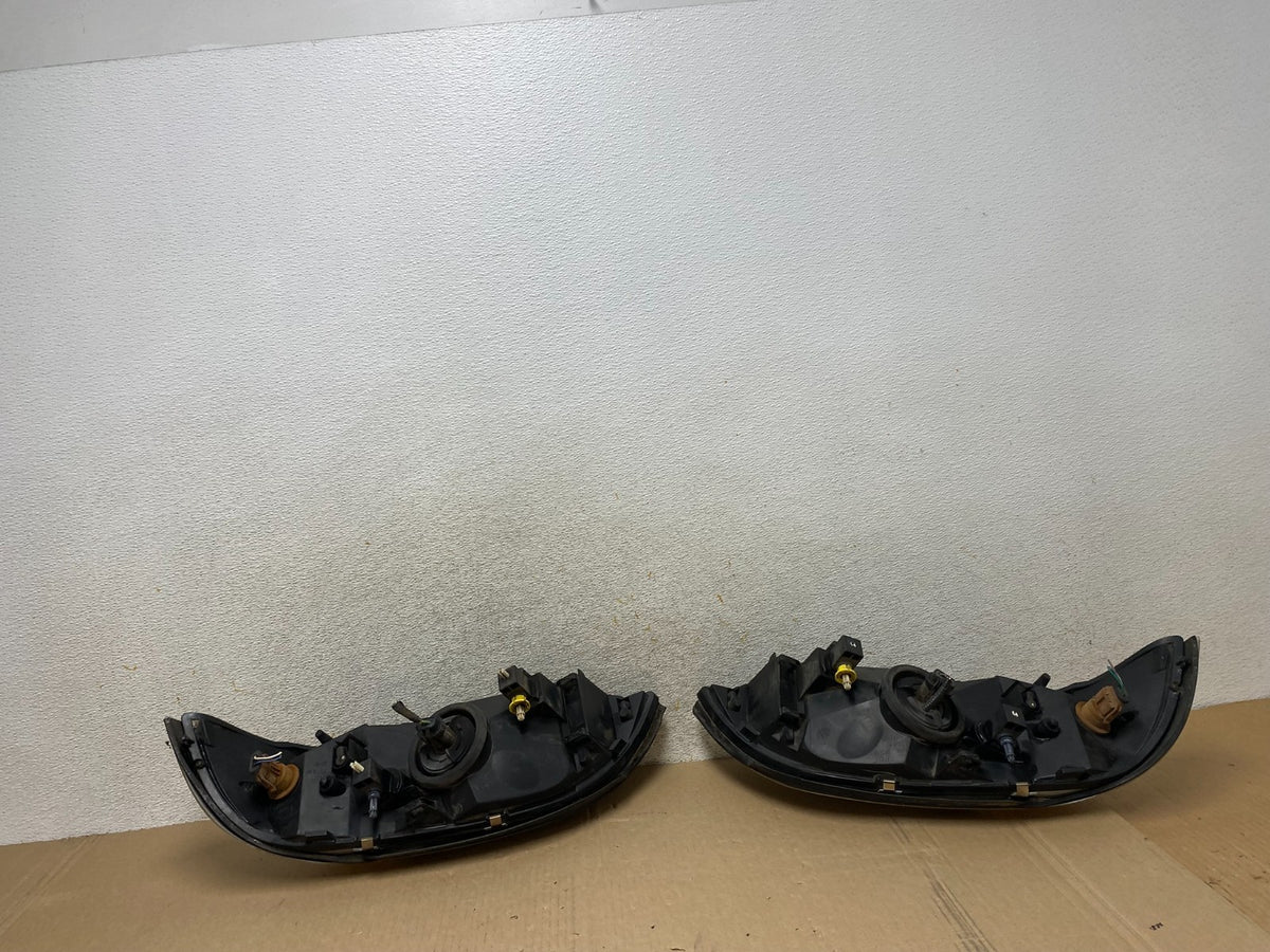 1999 to 2003 Ford Windstar Left+Right Halogen Headlights AJ1964 DW7