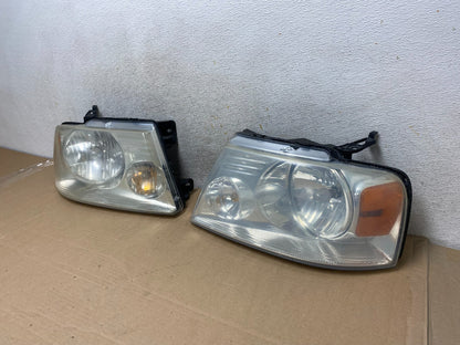 2004 to 2008 Ford F-150 F150 Left+Right Halogen Headlights AH9324 DW1