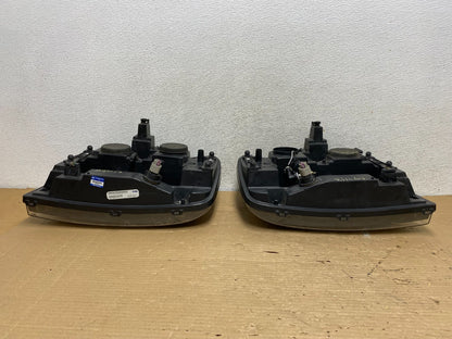 2006 - 2009 Chevrolet Trailblazer Left+Right Headlights Flush Half Bar AG9113 DW7