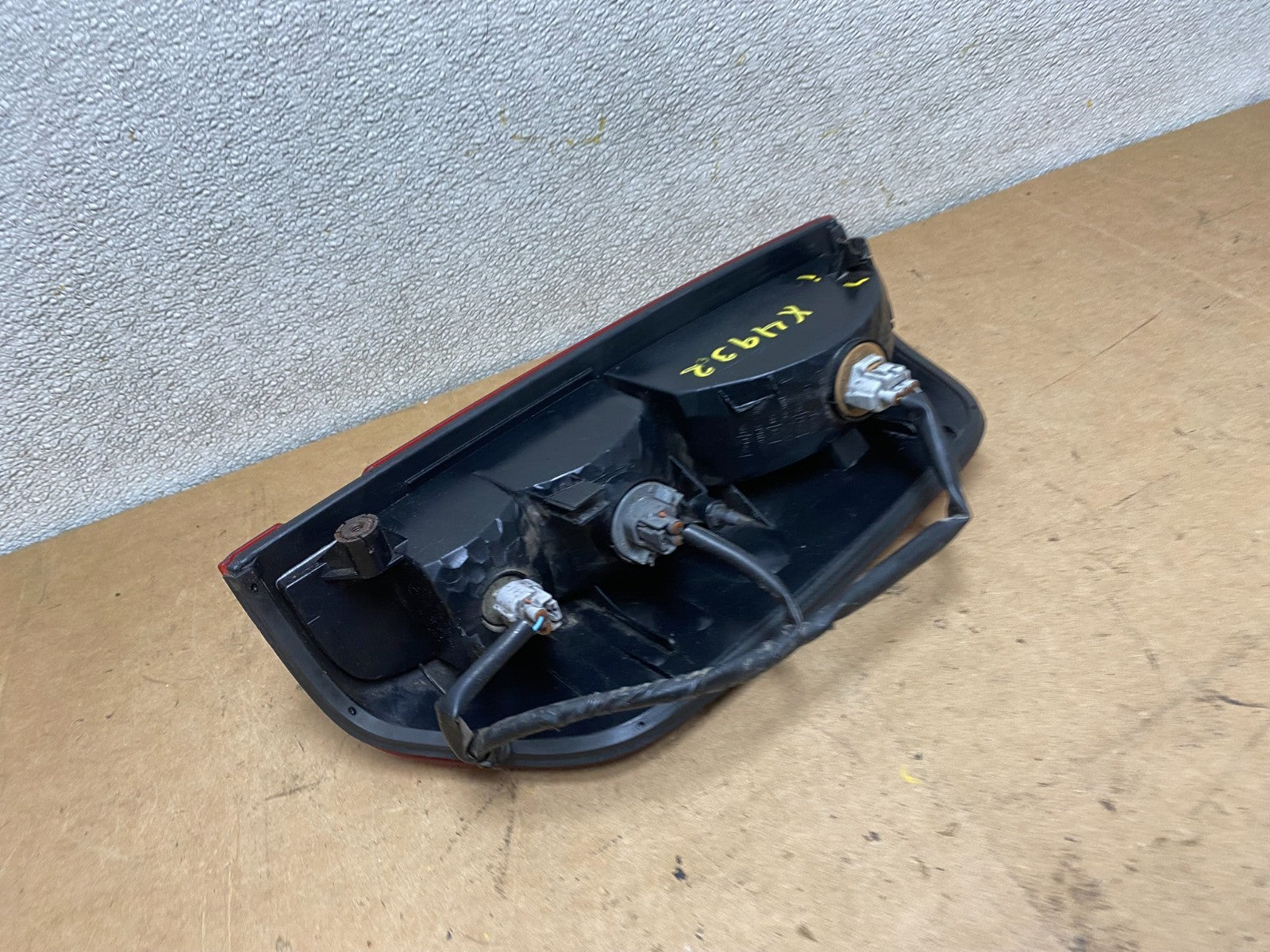 2005 to 2014 Nissan Frontier Left Driver LH Side Tail light Oem X4932 DW7