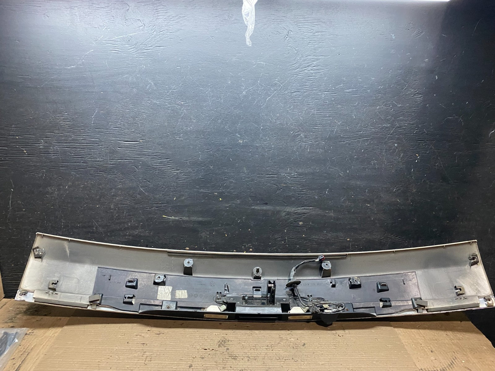 2011 to 2016 Chrysler Town & Country Tailgate Trim w/ Camera Panel OEM V2542 DG8