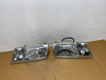 1998 to 2002 Mercury Grand Marquis Left+Right Set Halogen Headlight AE0558 DG0