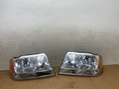 1999 - 2004 Jeep Grand Cherokee Left+Right Set Halogen Headlights AA6215 DW0
