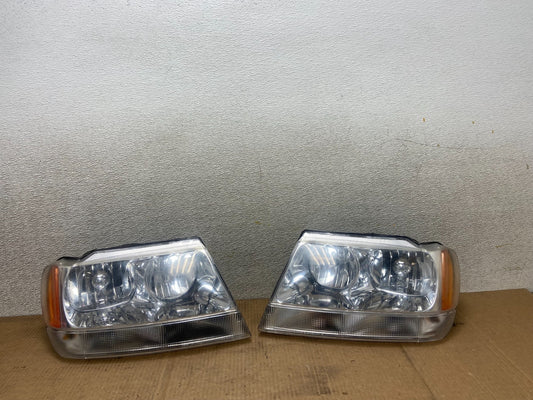 1999 - 2004 Jeep Grand Cherokee Left+Right Set Halogen Headlights AA6215 DW0
