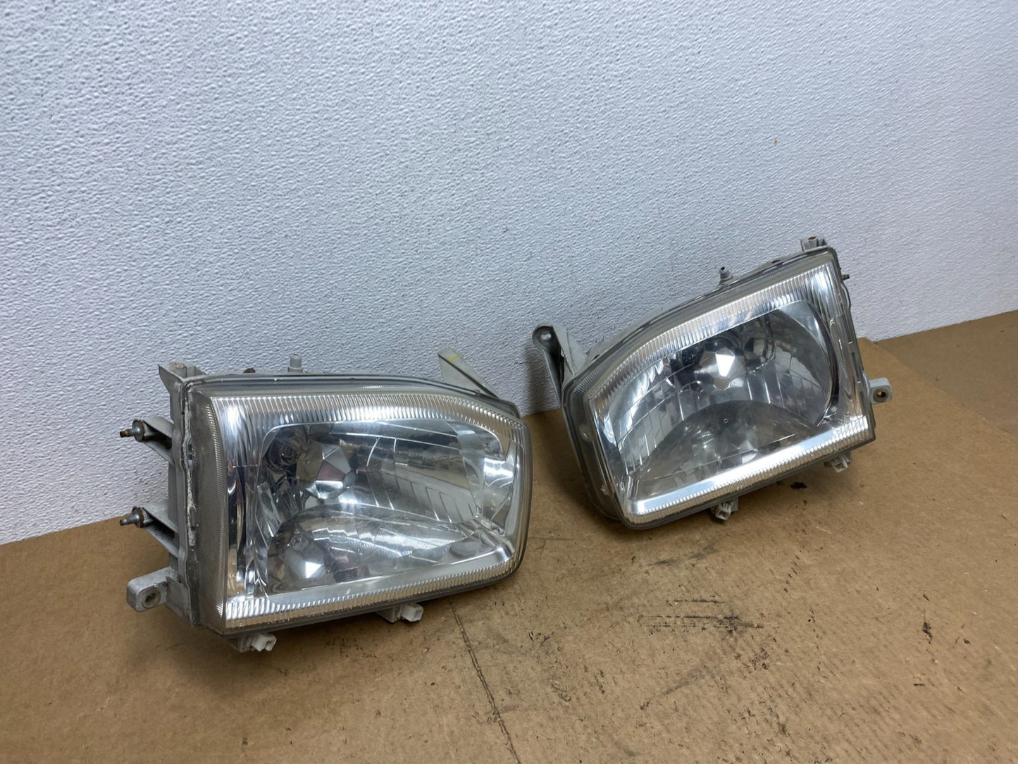 1999-2004 Nissan Pathfinder Left+Right Side Set Halogen Headlights AC3403 DW2