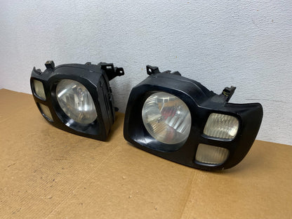 2002 2003 2004 Nissan Xterra Left+Right Side Headlights AE0510 DW1