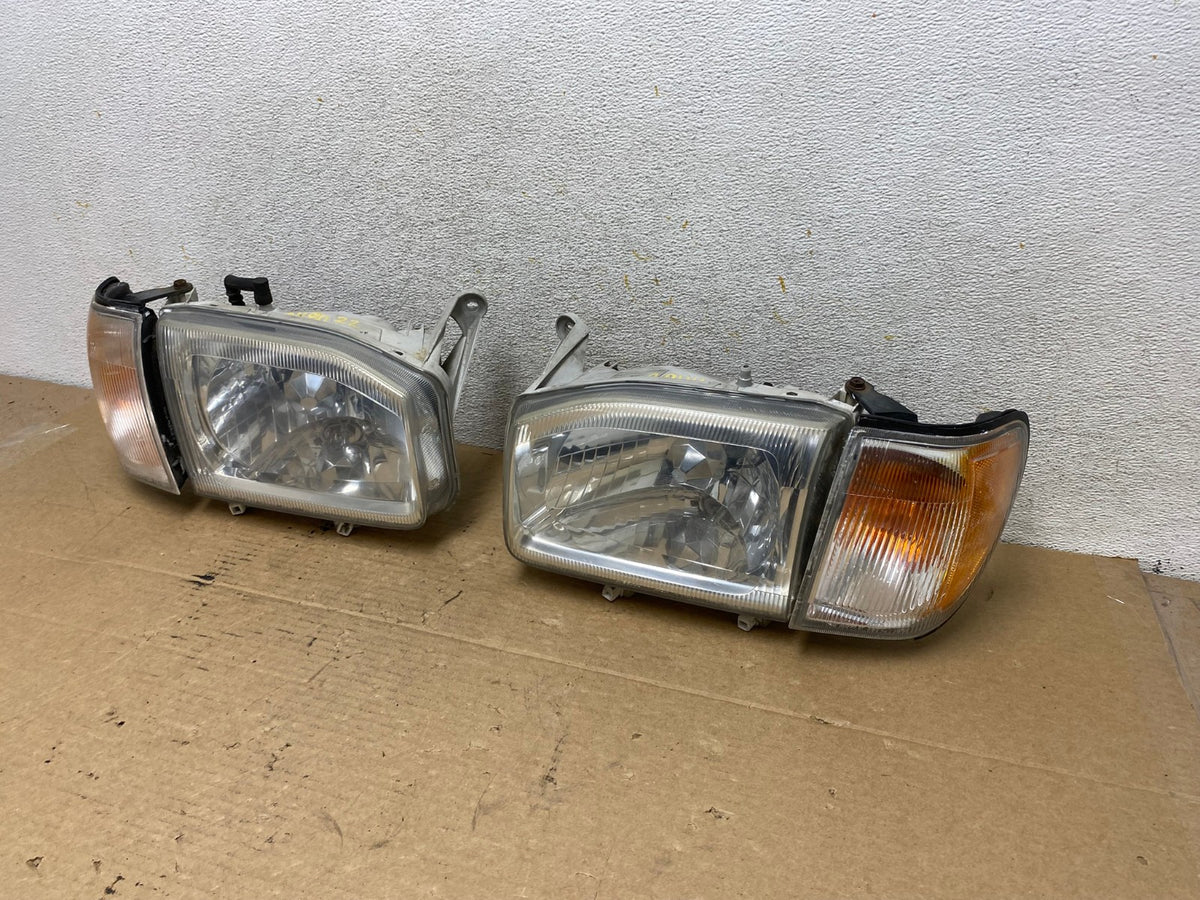 1999-2004 Nissan Pathfinder Left+Right Side Set Halogen Headlights AH8022 LK2