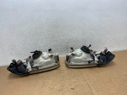 1999-2004 Nissan Pathfinder Left+Right Side Set Halogen Headlights AI7822 DW5