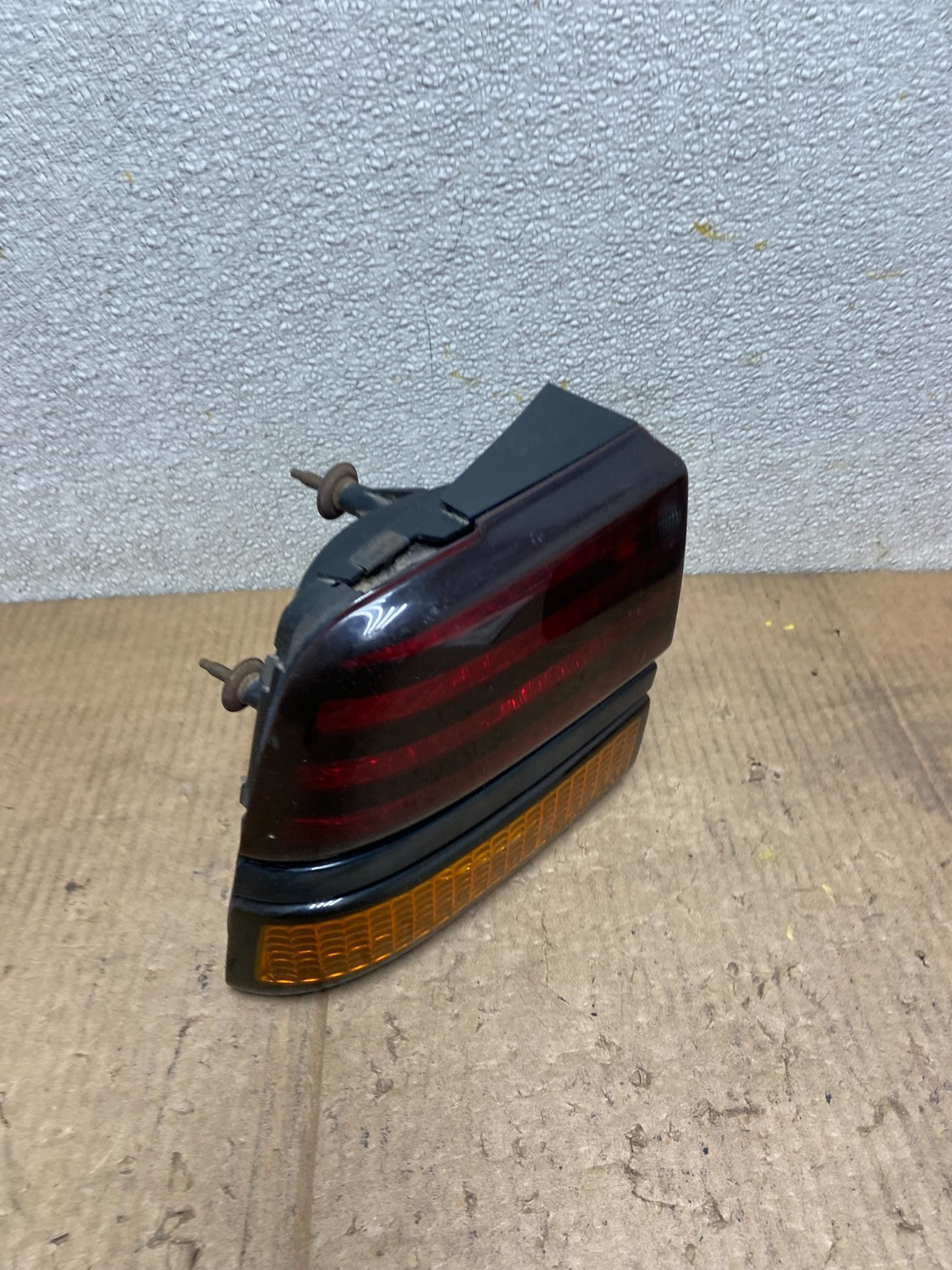 1988 to 1994 Pontiac Sunbird Left Driver Side Tail Light AA65932