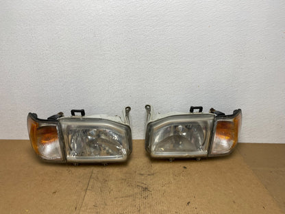 1999-2004 Nissan Pathfinder Left+Right Side Set Halogen Headlights Oem AC3404 DW0