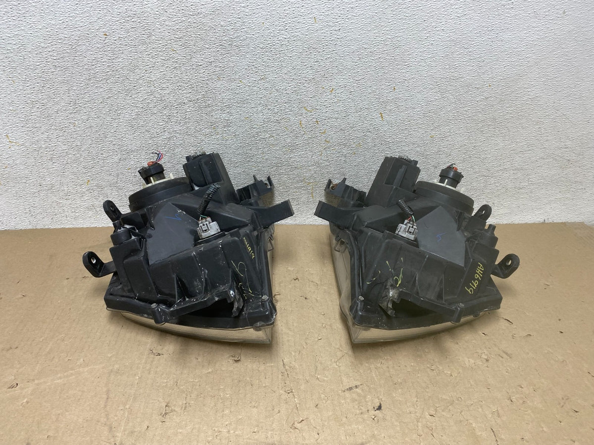 2005-2015 Nissan Xterra Driver Left+Right Side Set Headlights AH6919 DW10