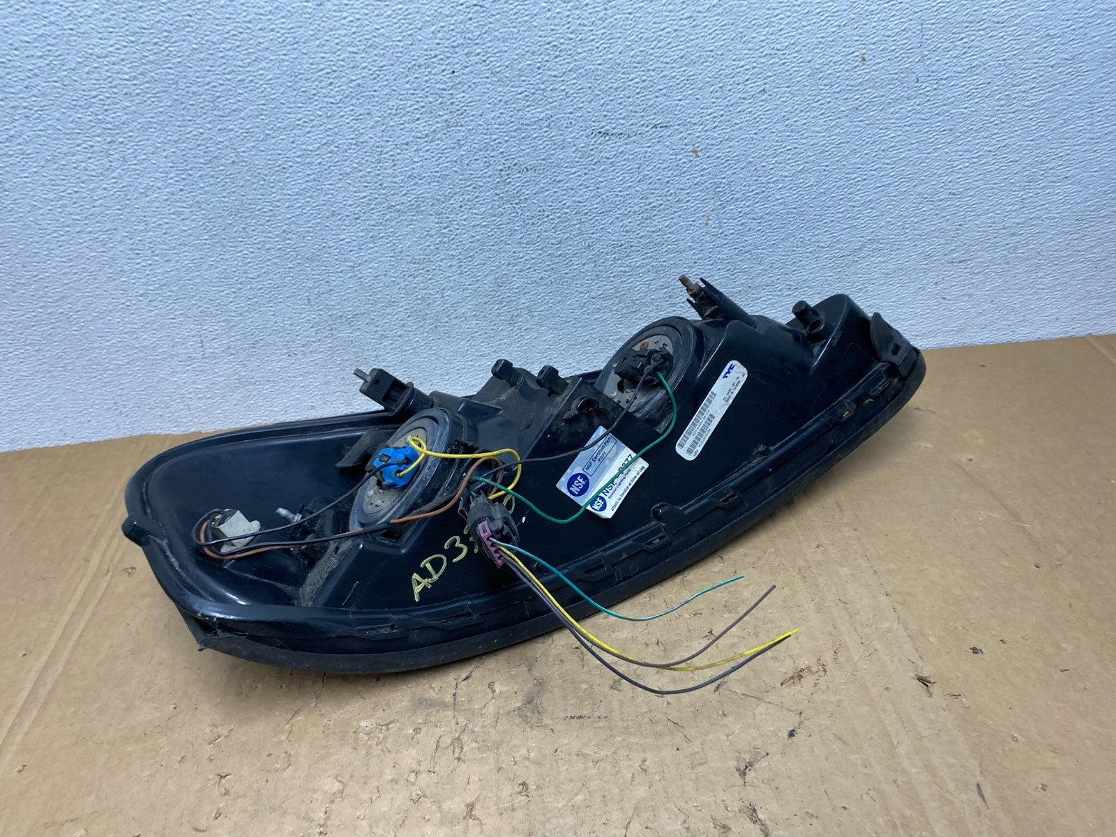 2004 to 2008 Pontiac Grand Prix Left Driver LH Black Headlight TYC AD3750 DW7