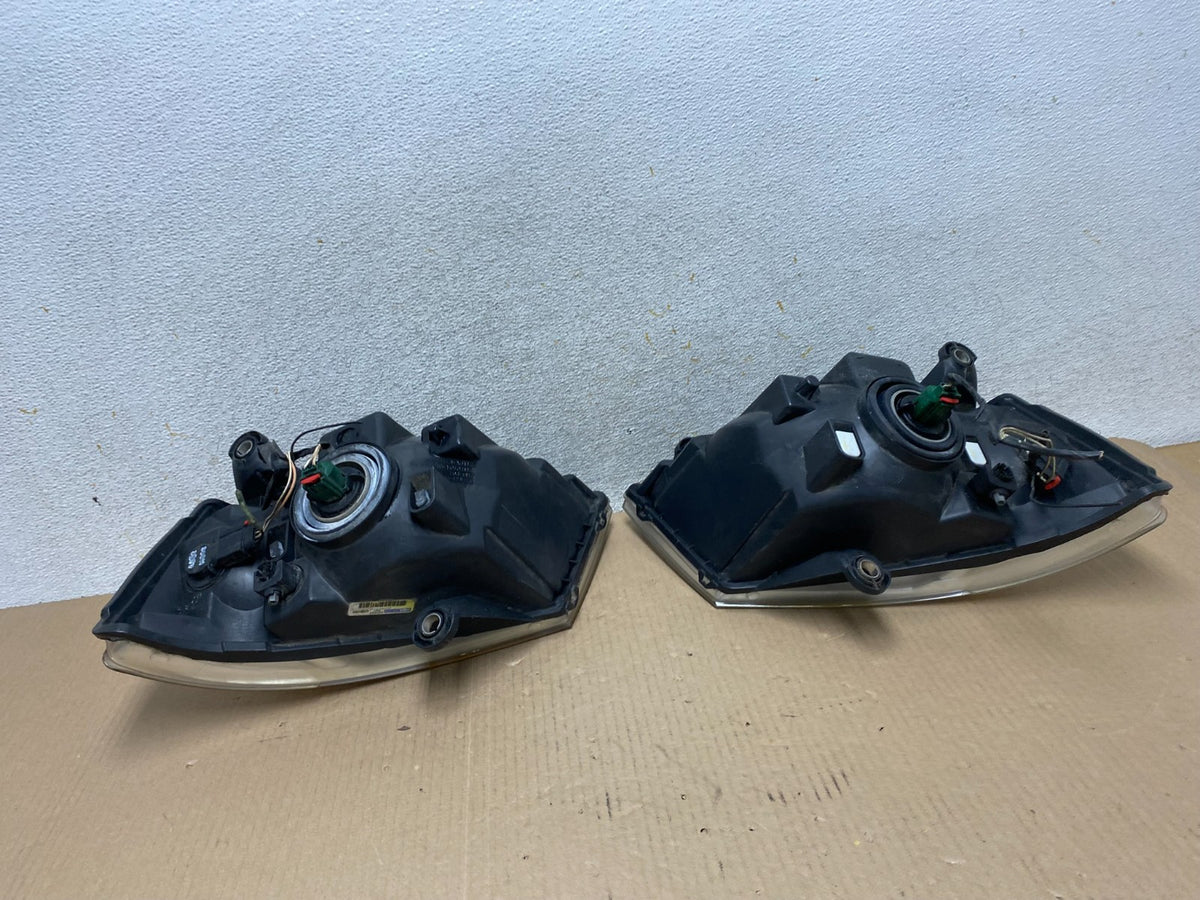 2008 to 2010 Dodge Caravan Left+Right Set Side Halogen Headlights AJ2424 DW6