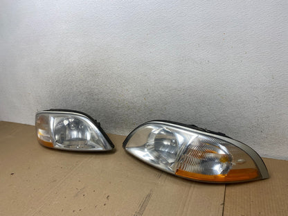 1999 to 2003 Ford Windstar Left+Right Halogen Headlights AJ1964 DW1