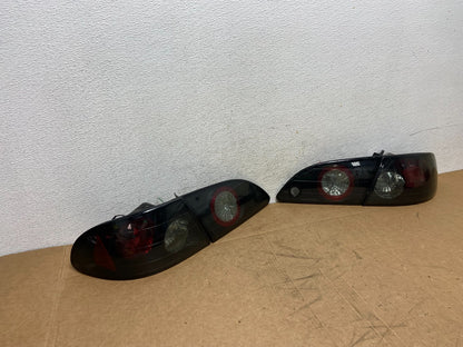 1998 to 2002 Toyota Corolla Left+Right Set Black Tail lights ad6368 DG2