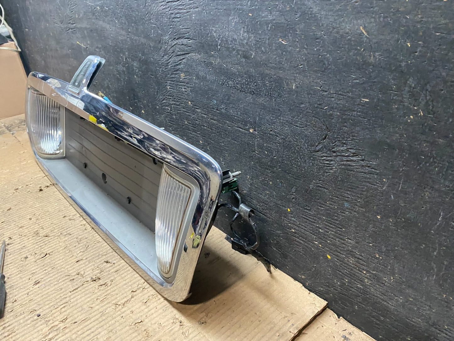 2003 to 2011 Lincoln Town Car Rear License Plate Trim Panel OEM T9702 DG1