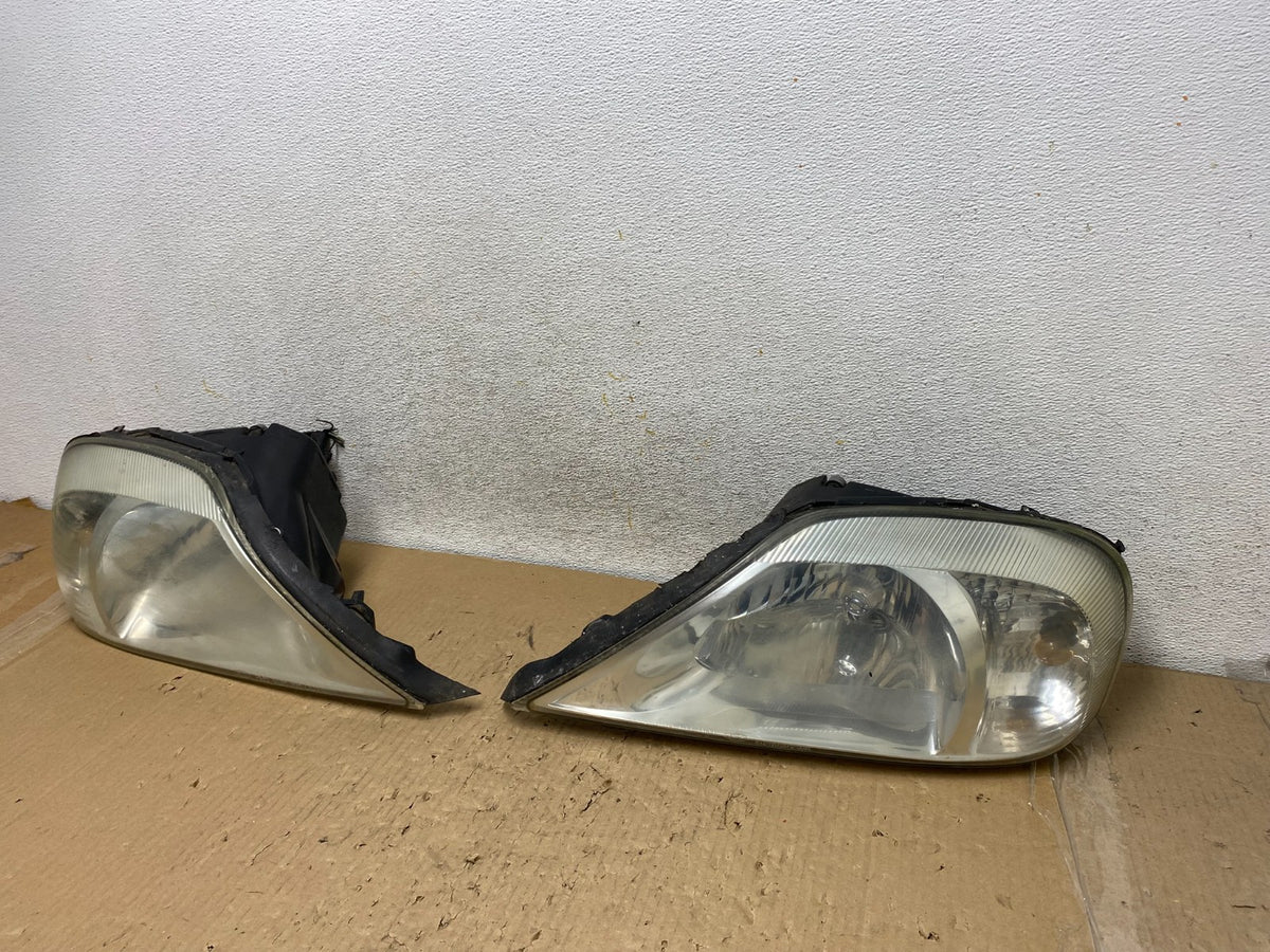 2000 to 2005 Mercury Sable Left+Right Side Halogen Headlights AH2849 DW2