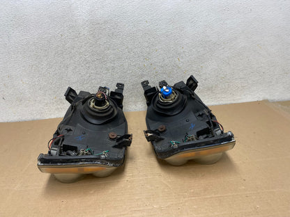 2001 to 2004 Nissan Frontier Left+Right Halogen Headlights AH9394 DW8