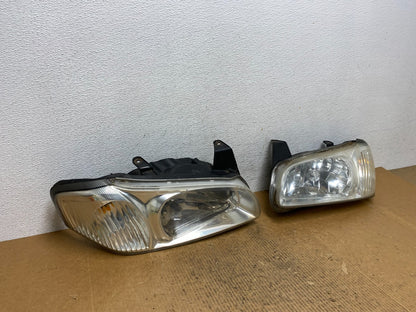 2000 to 2001 Nissan Maxima Left+Right Side Set Halogen Headlights AE1630 DW2