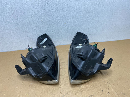 2004 - 2006 Nissan Sentra Halogen Left+Right Headlights TYC AD0566 DW7