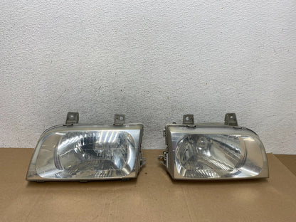 1998 to 2002 Kia Sportage Left+Right Halogen Headlights AE4855 DW0