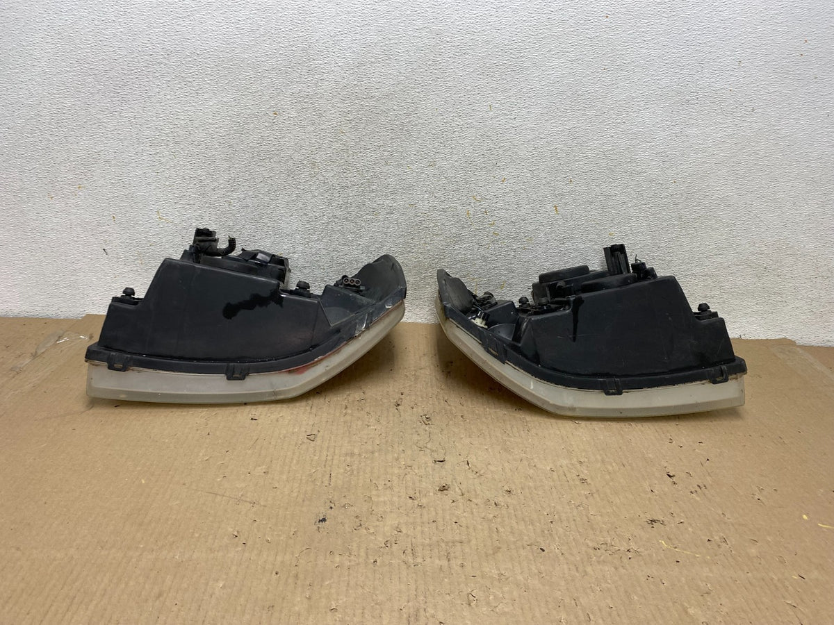 2002 to 2009 Gmc Envoy Left+Right Set Headlights Halogen AH6001 DW10