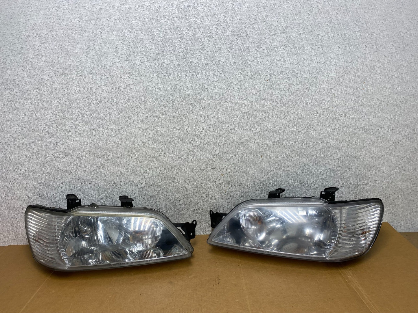 2002 - 2003 Mitsubishi Lancer Left+Right Side Headlights Halogen AD89390