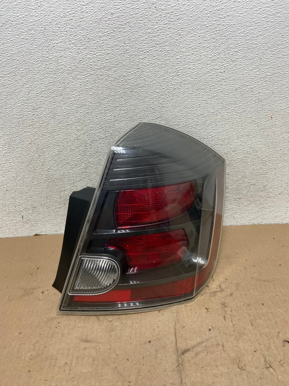 2007 to 2012 Nissan Sentra Right Passenger Rh Black Tail Light AG5539 LK0