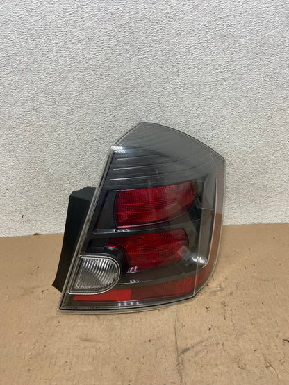 2007 to 2012 Nissan Sentra Right Passenger Rh Black Tail Light AG5539 LK0